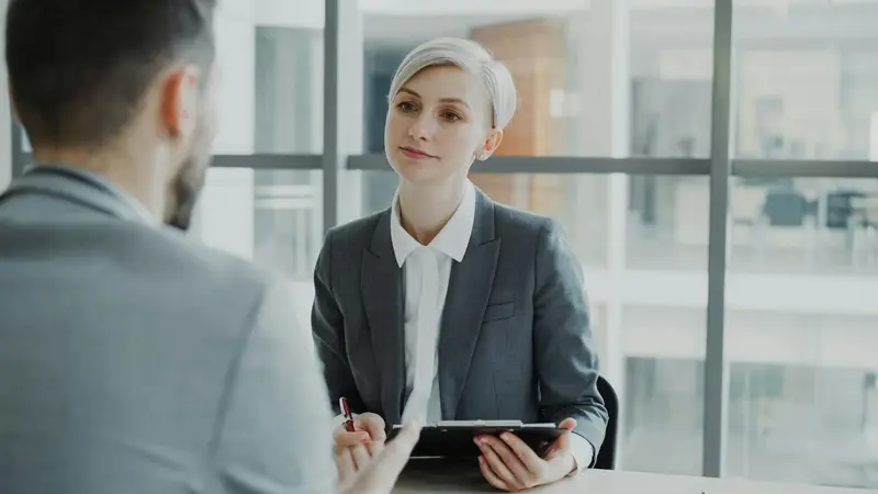 an interview across a desk