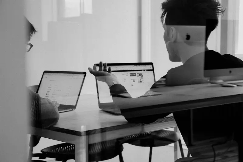 a sales meeting over a laptop